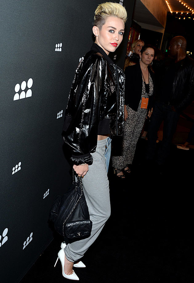 Miley Cyrus Channels Rihanna in Crazy Two-Toned Jeans at Myspace Event