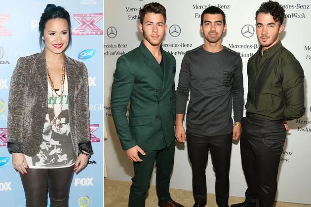 LOS ANGELES, CA - NOVEMBER 04: Singer Demi Lovato attends Fox's 'The X Factor' Finalist Party at the SLS Hotel on November 4, 2013 in Los Angeles, California. (Photo by Frederick M. Brown/Getty Images) / NEW YORK, NY - SEPTEMBER 05: (L-R) Nick Jonas, Joe Jonas, and Kevin Jonas of the Jonas Brothers attend the Mercedes-Benz Star Lounge during Mercedes-Benz Fashion Week Spring 2014 at Lincoln Center on September 5, 2013 in New York City. (Photo by Mike Coppola/Getty Images for Mercedes-Benz) LOS ANGELES, CA - NOVEMBER 04: Singer Demi Lovato attends Fox's 'The X Factor' Finalist Party at the SLS Hotel on November 4, 2013 in Los Angeles, California. (Photo by Frederick M. Brown/Getty Images) / NEW YORK, NY - SEPTEMBER 05: (L-R) Nick Jonas, Joe Jonas, and Kevin Jonas of the Jonas Brothers attend the Mercedes-Benz Star Lounge during Mercedes-Benz Fashion Week Spring 2014 at Lincoln Center on September 5, 2013 in New York City. (Photo by Mike Coppola/Getty Images for Mercedes-Benz)