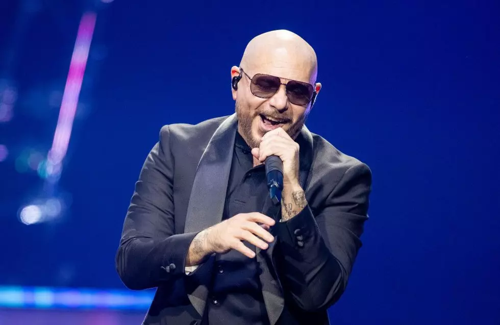 How Pitbull Really Feels About His Fans Wearing Bald Caps to His Concerts
